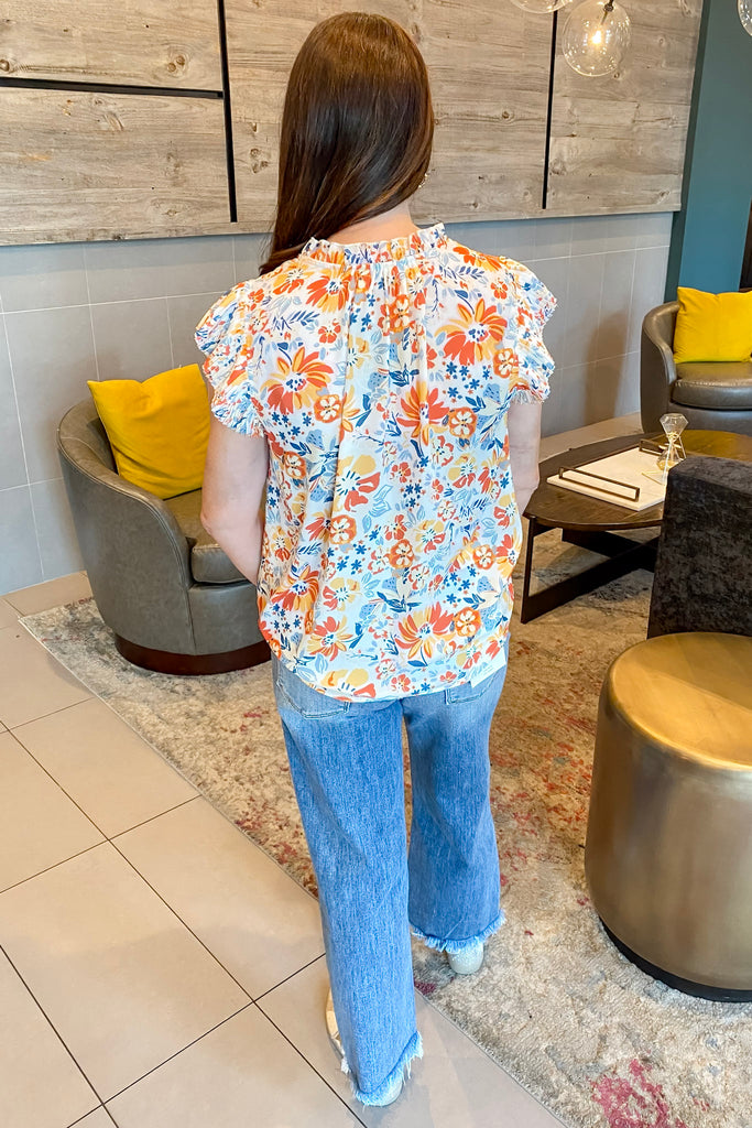 Orange and Navy Love Floral Print Pleat Top - Lyla's: Clothing, Decor & More - Plano Boutique