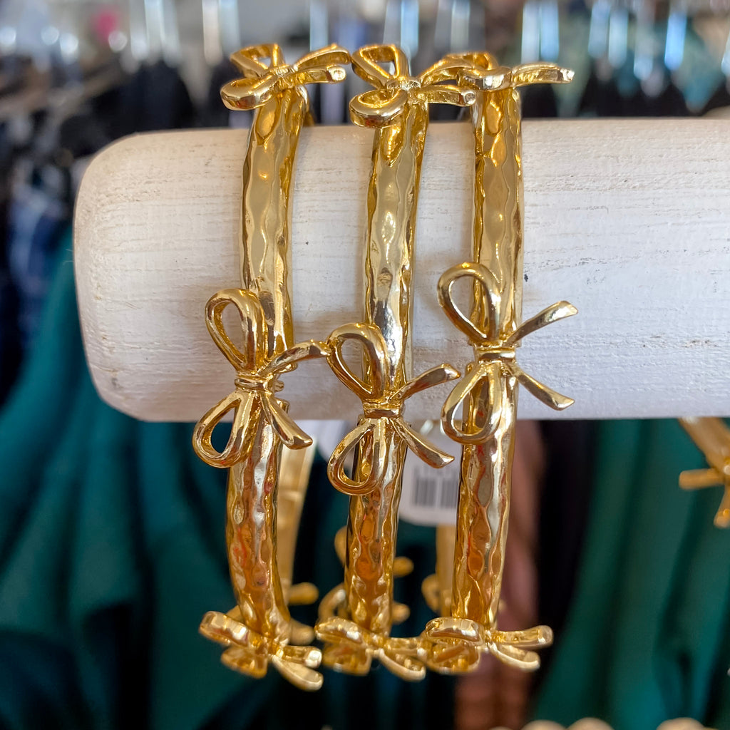 Bow Gold Bracelet by Meghan Browne - Lyla's: Clothing, Decor & More - Plano Boutique