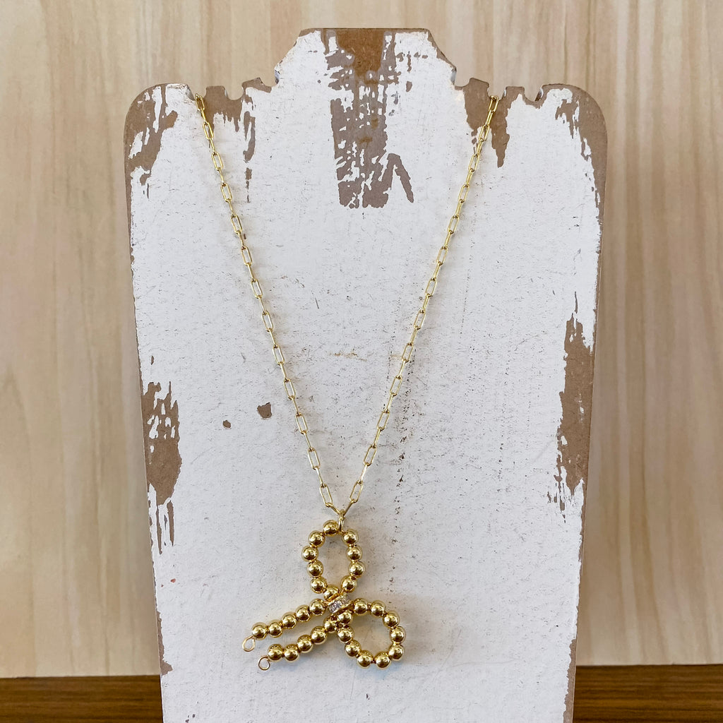 Long Beaded Bow Necklace - Lyla's: Clothing, Decor & More - Plano Boutique